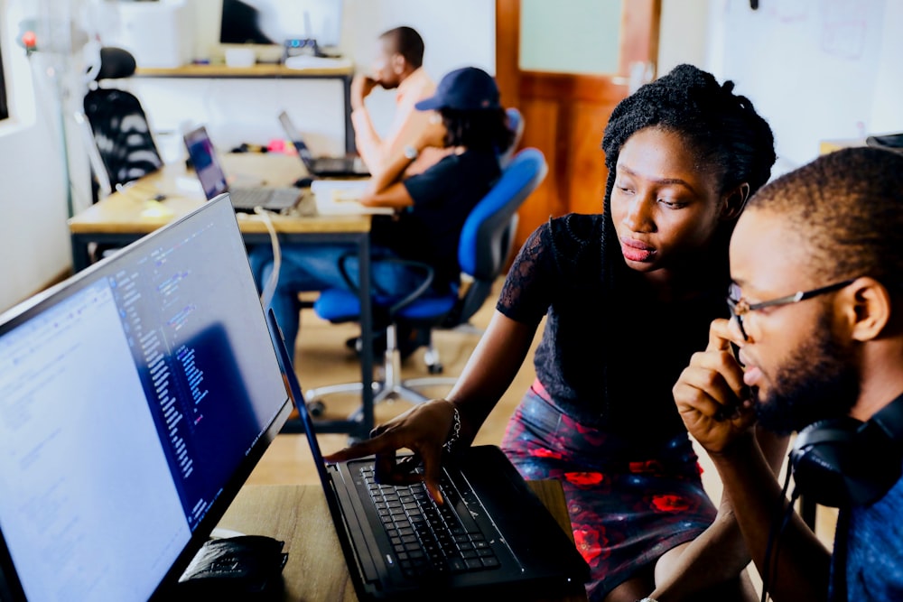 Agiletech247 team members collaborating in a modern office
