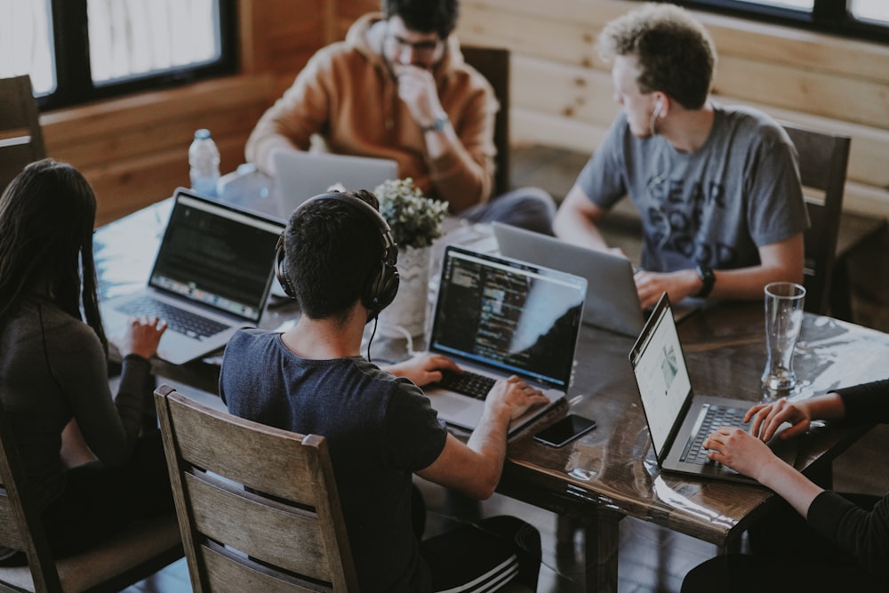 Agiletech247 team of consultants collaborating in a modern office